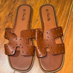 Brand new Woman’s Brown stud sandals